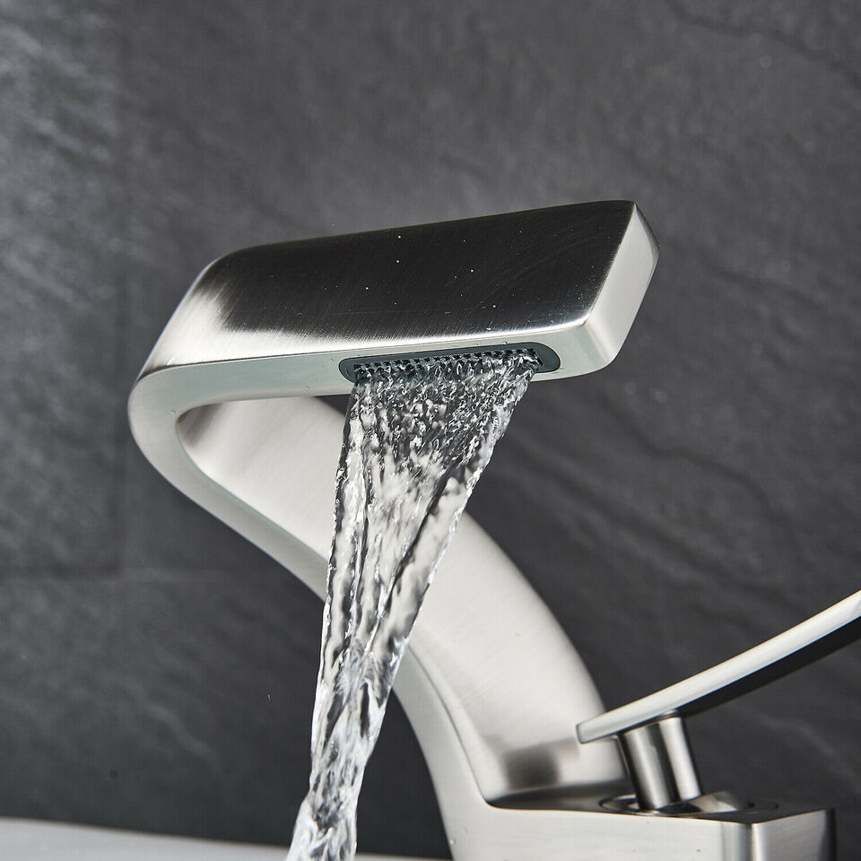 Sleek Faucet With Waterfall Spout And Dual Handles For Kitchen And Bath