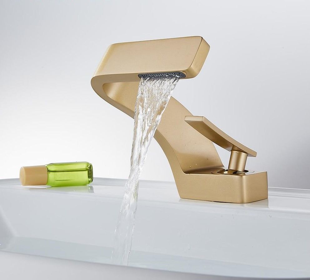 Sleek Faucet With Waterfall Spout And Dual Handles For Kitchen And Bath