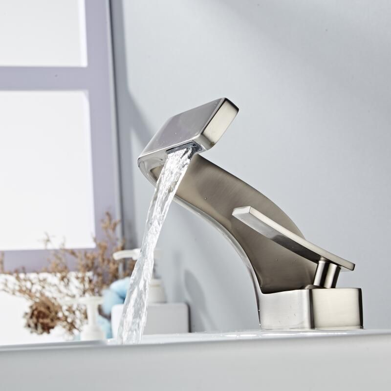 Sleek Faucet With Waterfall Spout And Dual Handles For Kitchen And Bath