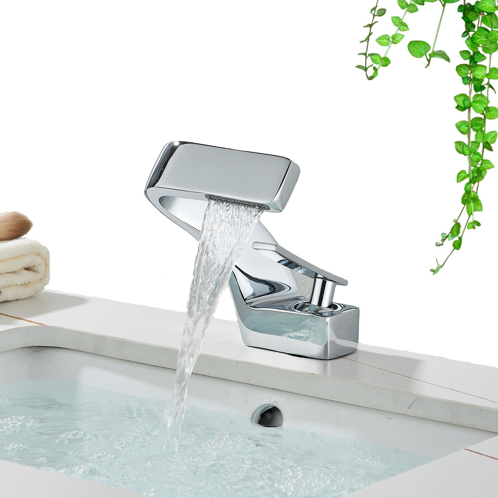 Sleek Faucet With Waterfall Spout And Dual Handles For Kitchen And Bath