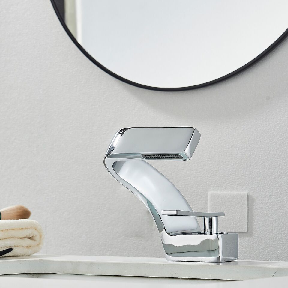 Sleek Faucet With Waterfall Spout And Dual Handles For Kitchen And Bath
