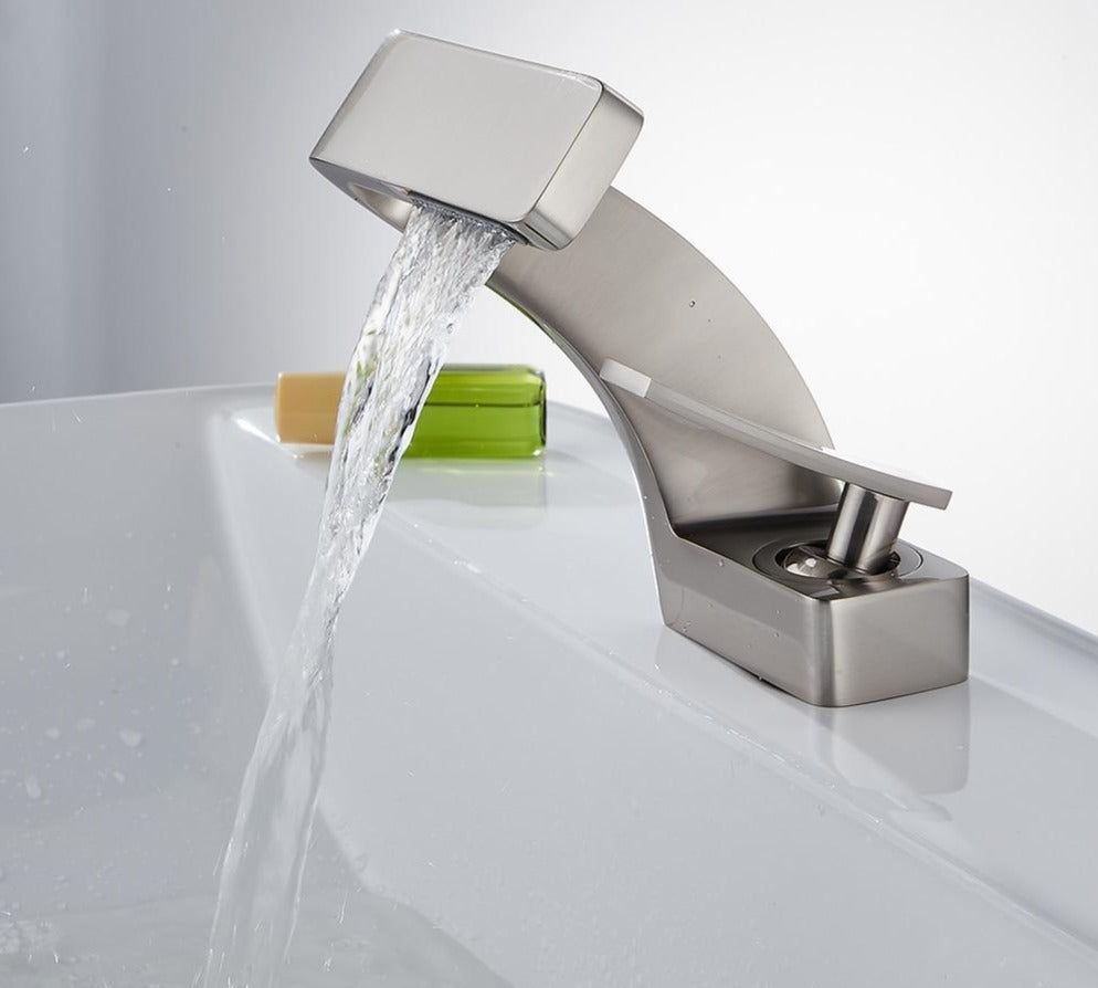 Sleek Faucet With Waterfall Spout And Dual Handles For Kitchen And Bath
