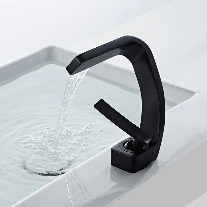 Sleek Faucet With Waterfall Spout And Dual Handles For Kitchen And Bath