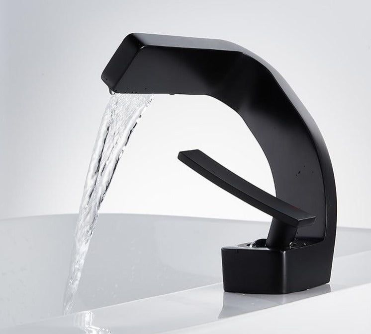 Sleek Faucet With Waterfall Spout And Dual Handles For Kitchen And Bath