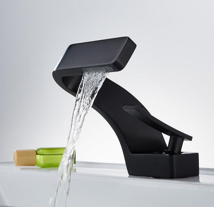 Sleek Faucet With Waterfall Spout And Dual Handles For Kitchen And Bath