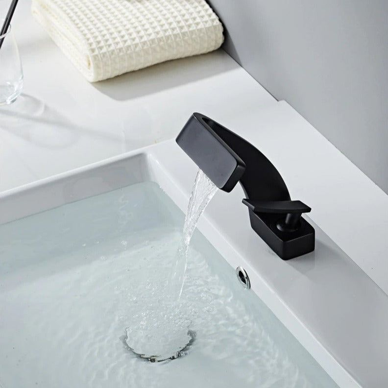 Sleek Faucet With Waterfall Spout And Dual Handles For Kitchen And Bath