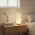 Velo LED Desk Lamp With Sculpted Form And Warm Ambient Glow