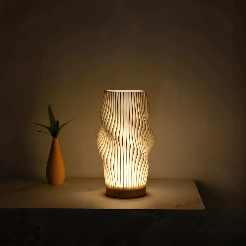 Velo LED Desk Lamp With Sculpted Form And Warm Ambient Glow