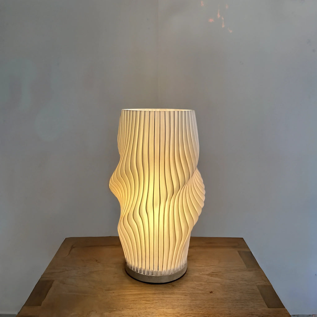 Velo LED Desk Lamp With Sculpted Form And Warm Ambient Glow