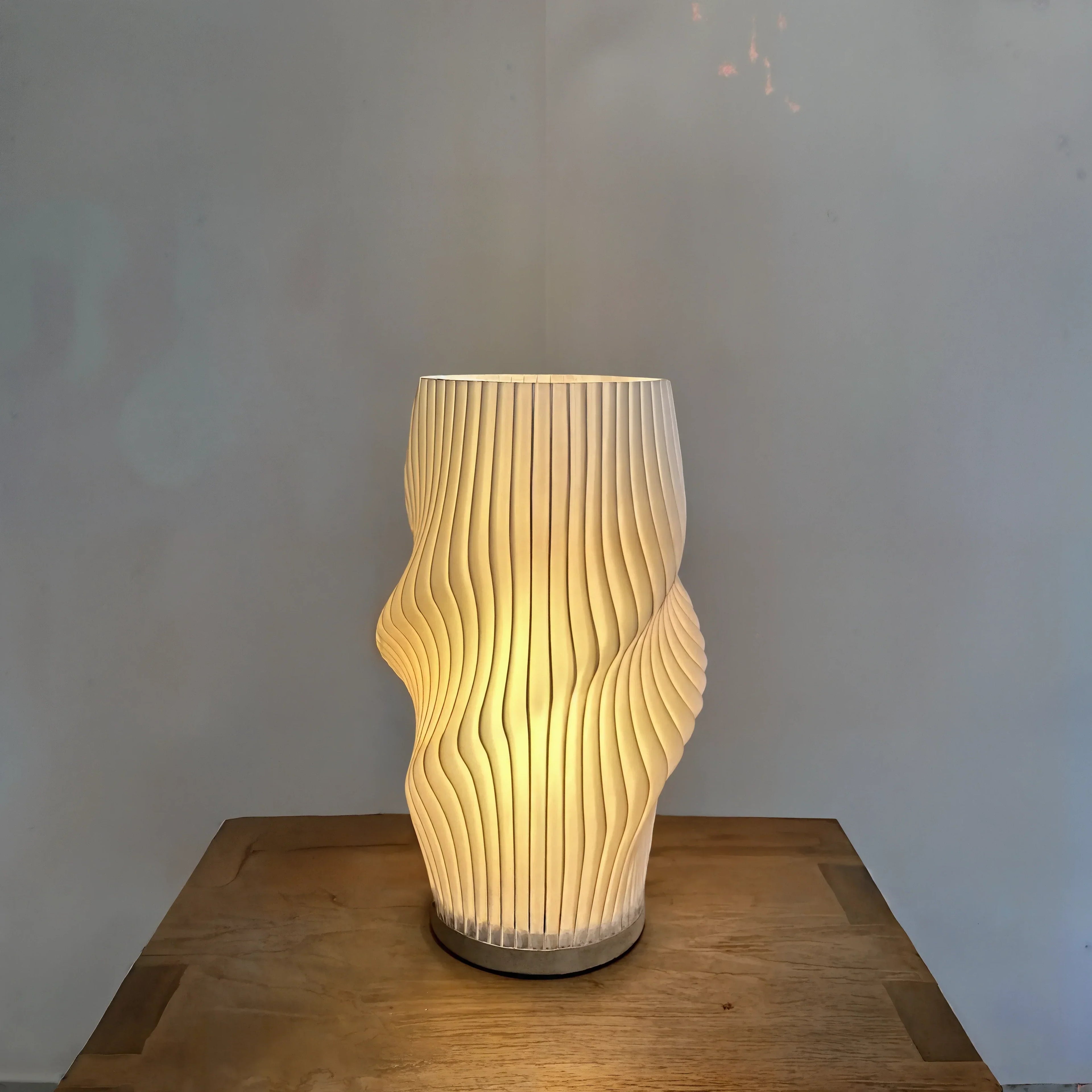 Velo LED Desk Lamp With Sculpted Form And Warm Ambient Glow