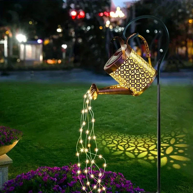 Outdoor Spaces Glow With Whimsical Solar Lantern In Retro Watering Can Silhouette